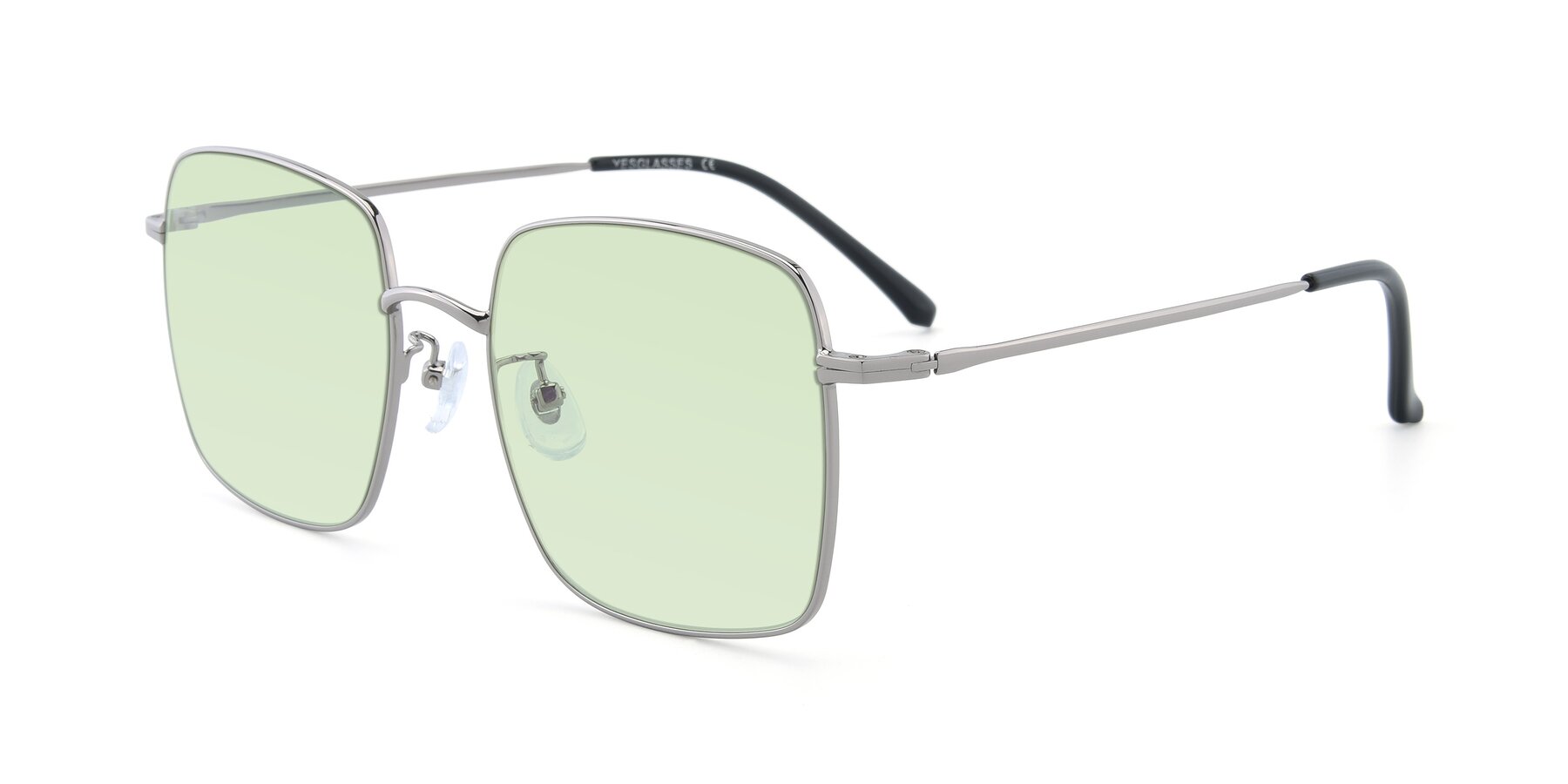 Angle of Billie in Silver with Light Green Tinted Lenses