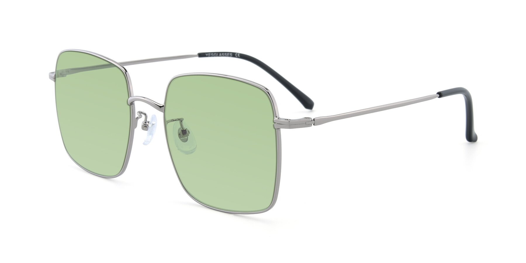 Angle of Billie in Silver with Medium Green Tinted Lenses