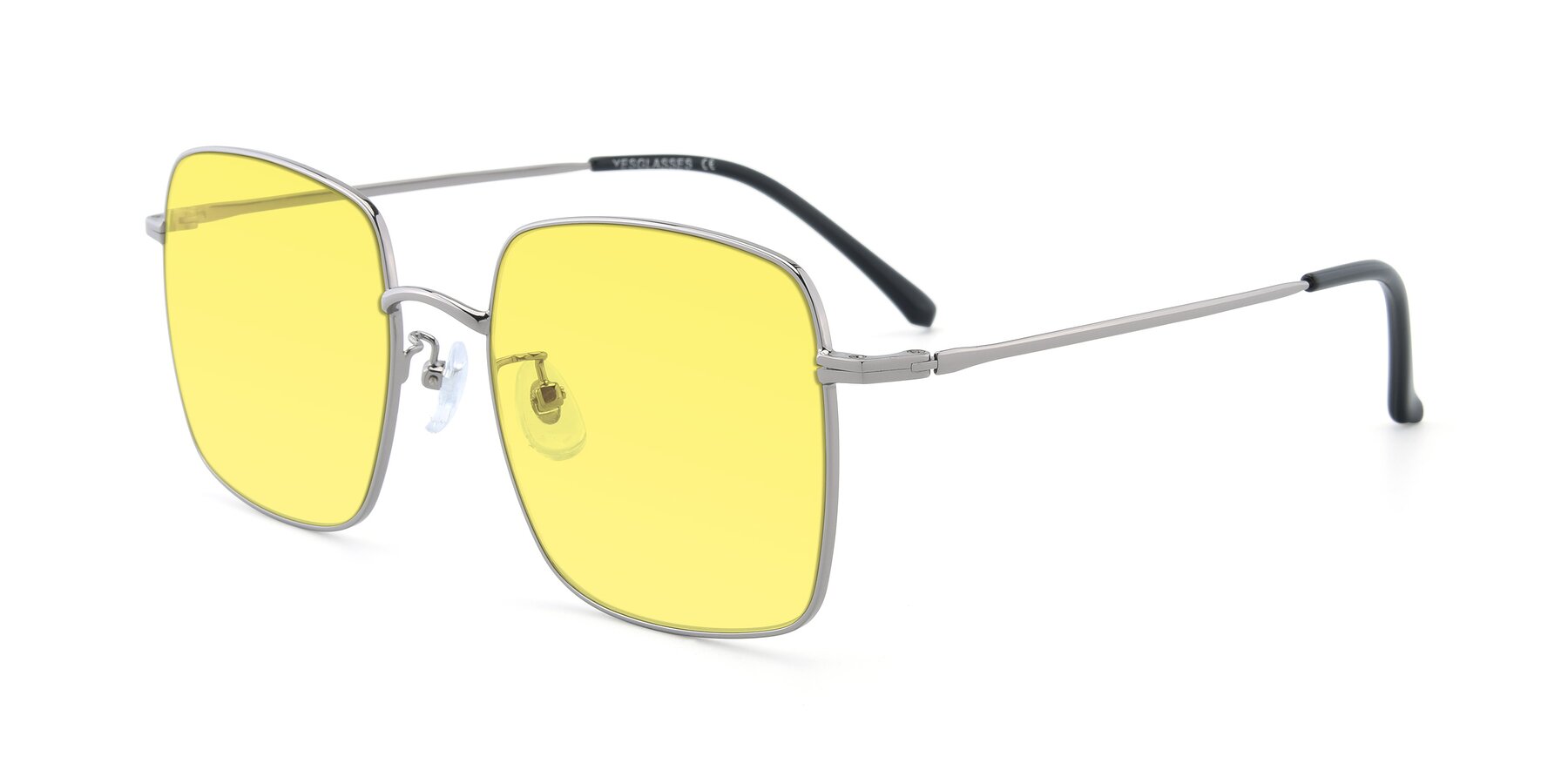 Angle of Billie in Silver with Medium Yellow Tinted Lenses