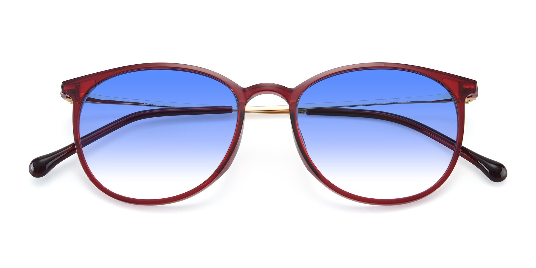View of XC-6006 in Wine-Gold with Blue Gradient Lenses