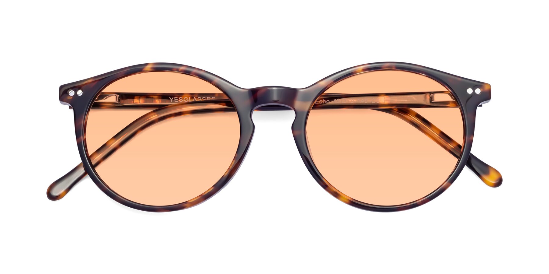 Folded Front of Echo in Tortoise with Light Orange Tinted Lenses