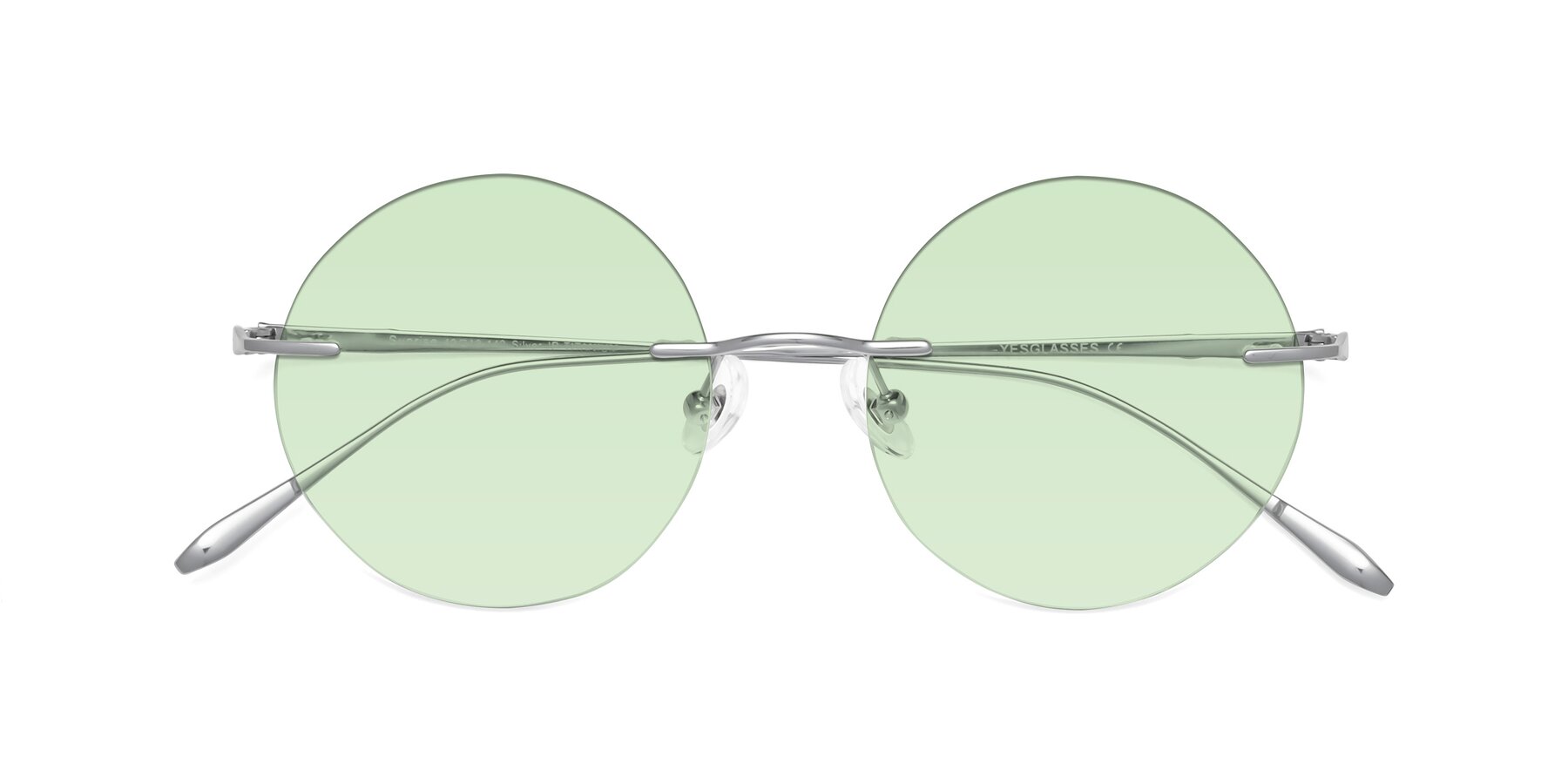 Folded Front of Sunrise in Silver with Light Green Tinted Lenses