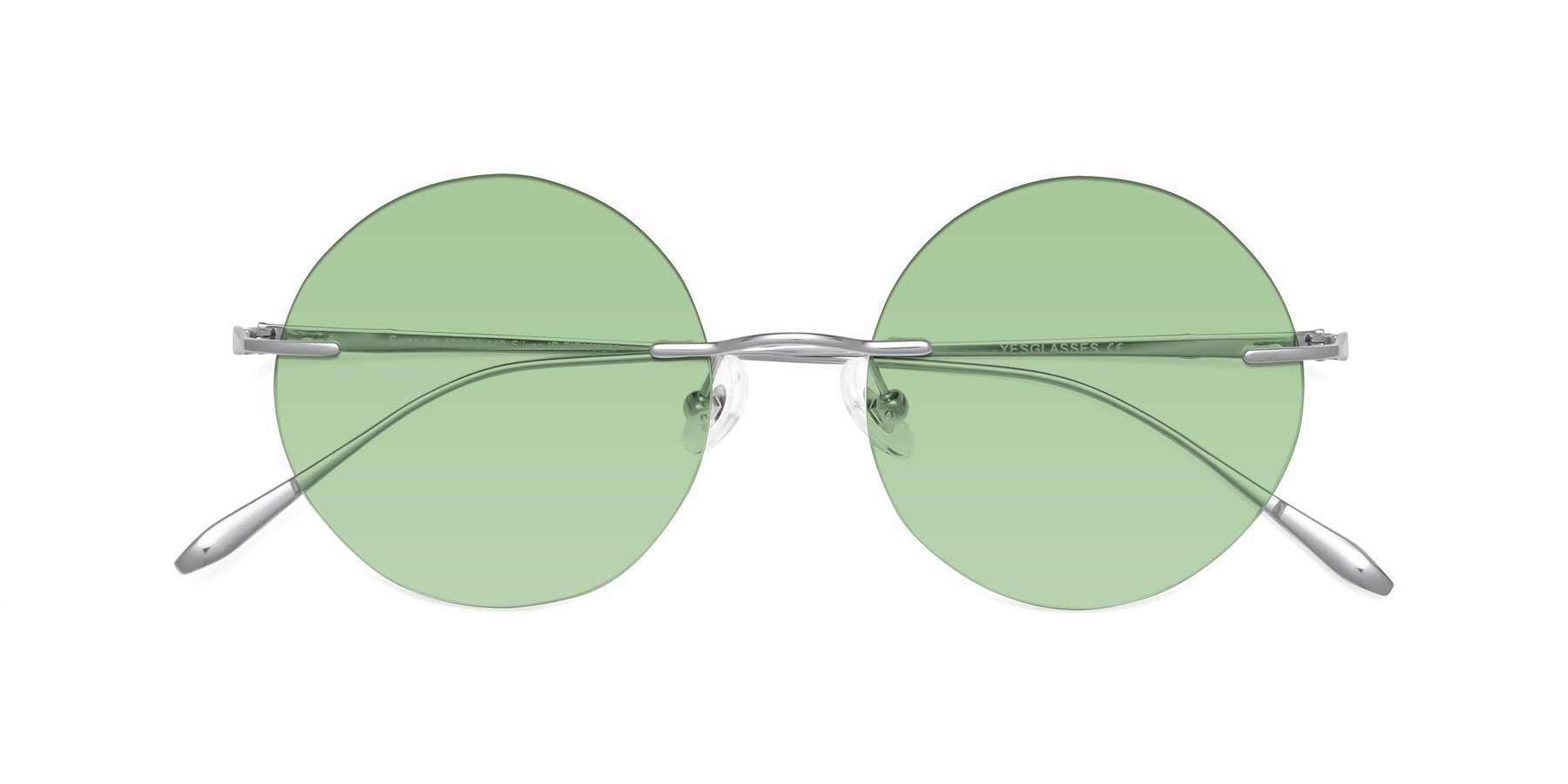 Folded Front of Sunrise in Silver with Medium Green Tinted Lenses