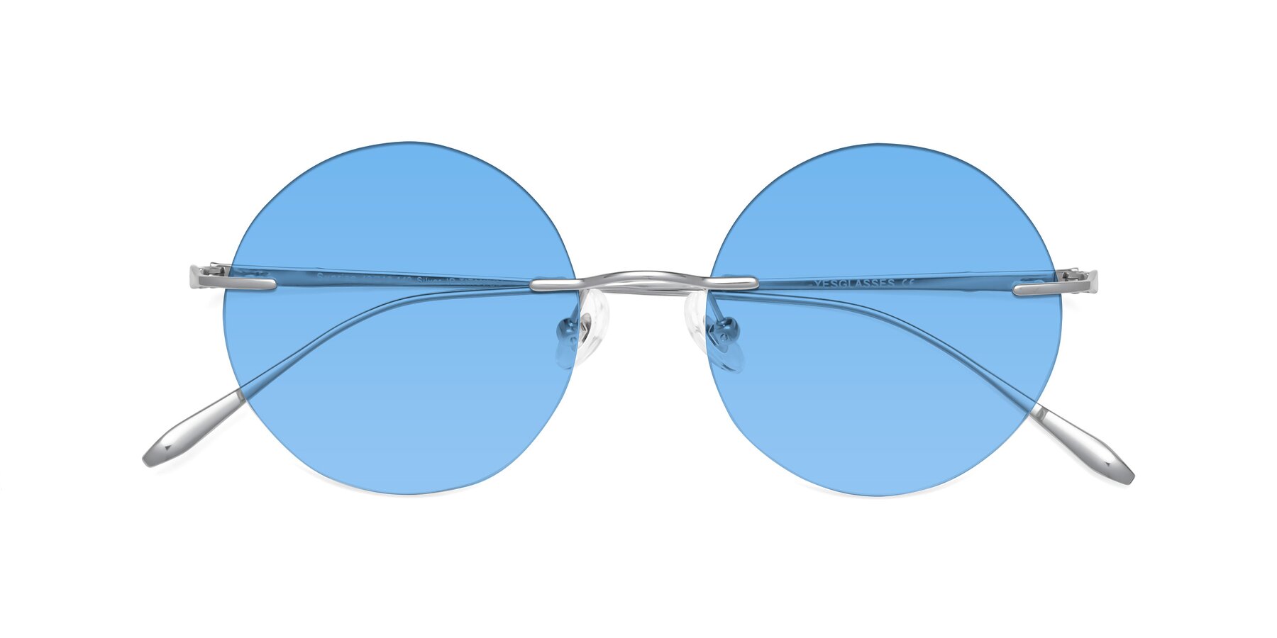 Folded Front of Sunrise in Silver with Medium Blue Tinted Lenses