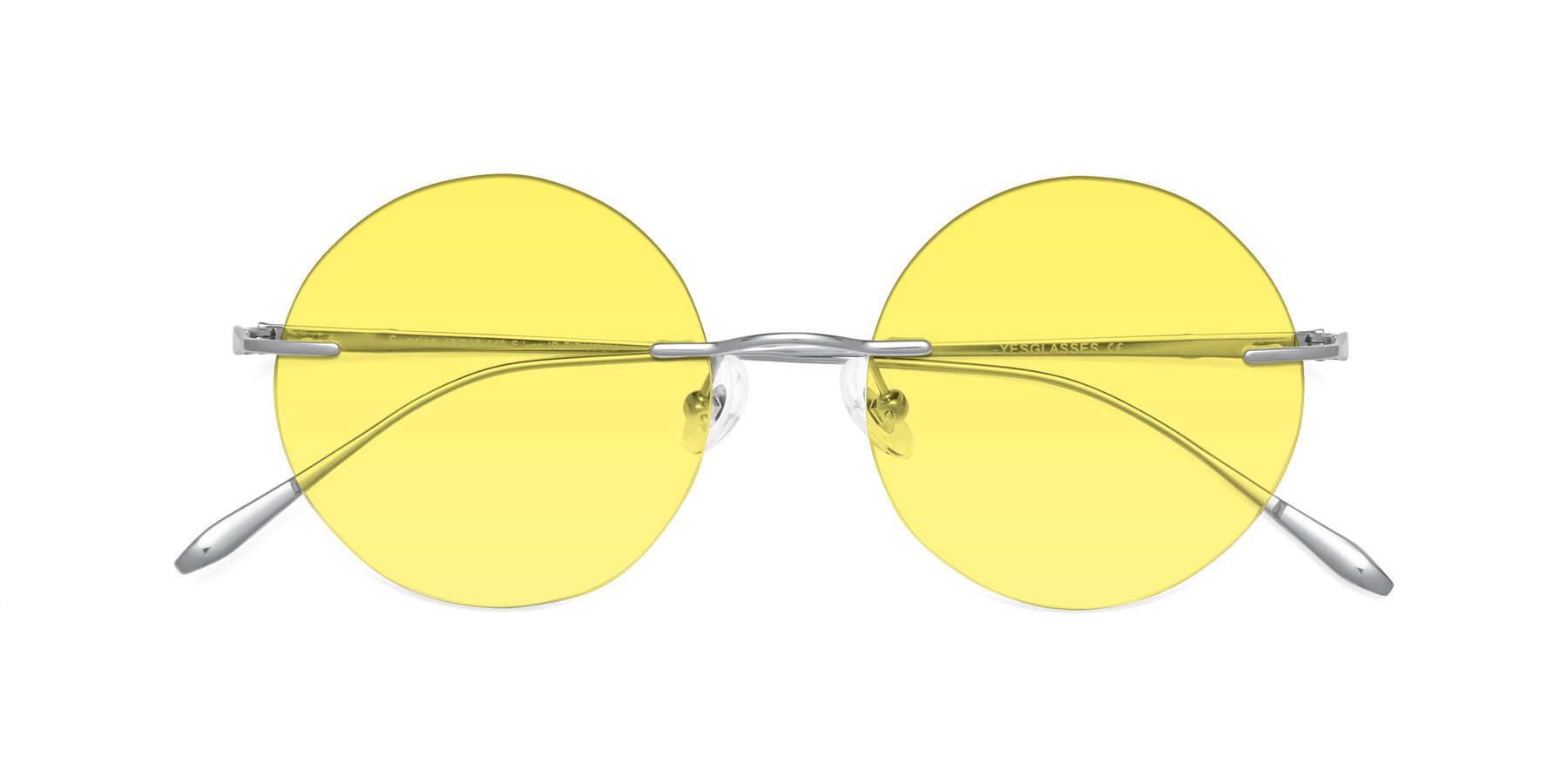 Folded Front of Sunrise in Silver with Medium Yellow Tinted Lenses