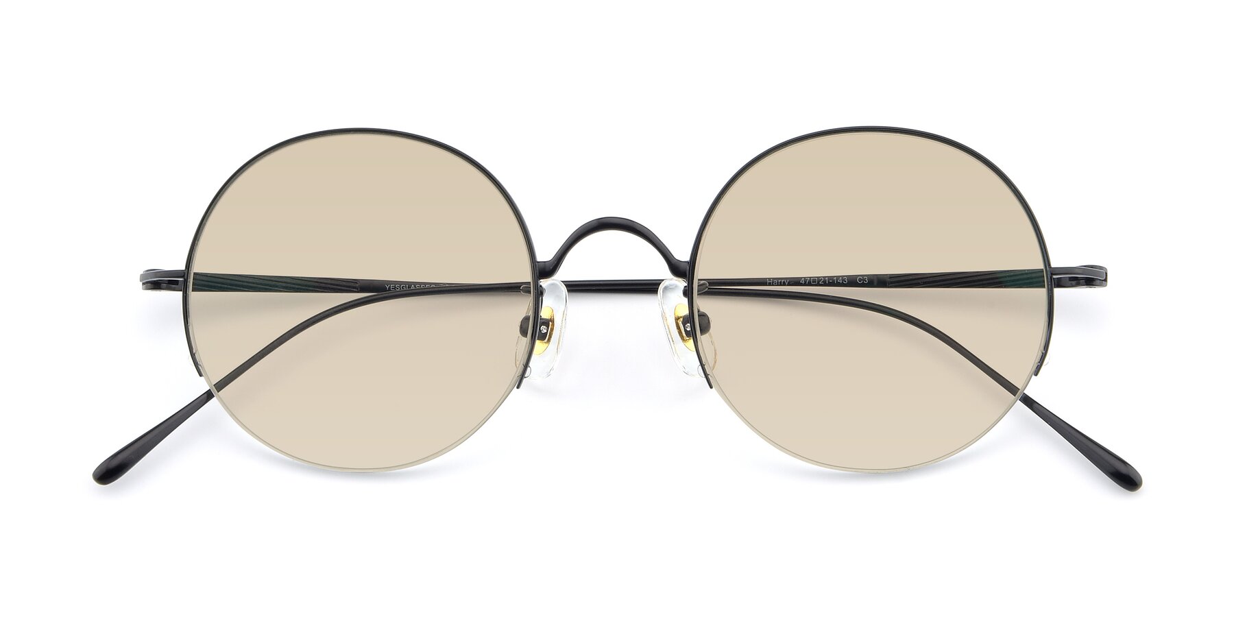 Folded Front of Harry in Matte Black with Light Brown Tinted Lenses