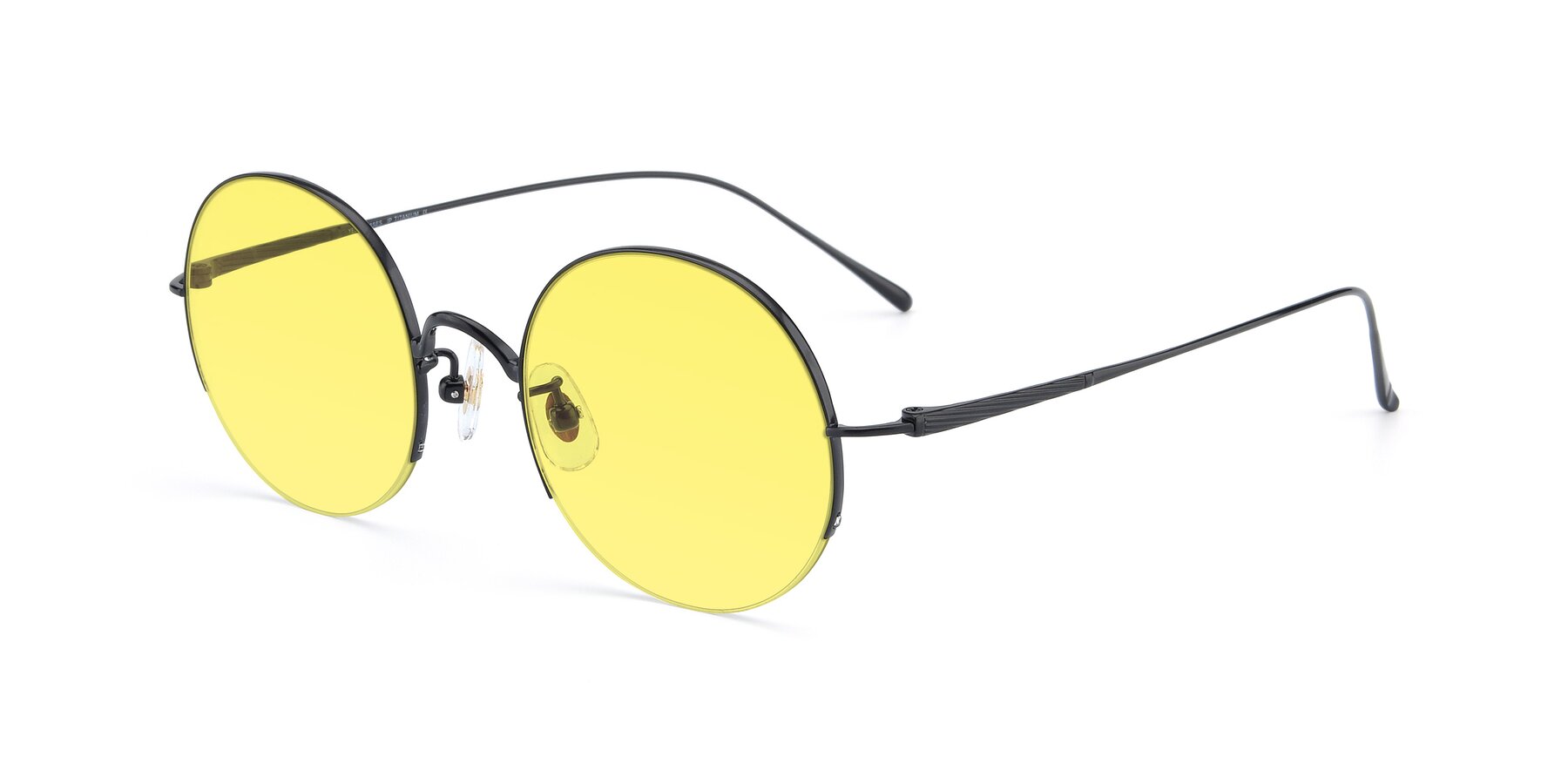 Angle of Harry in Matte Black with Medium Yellow Tinted Lenses