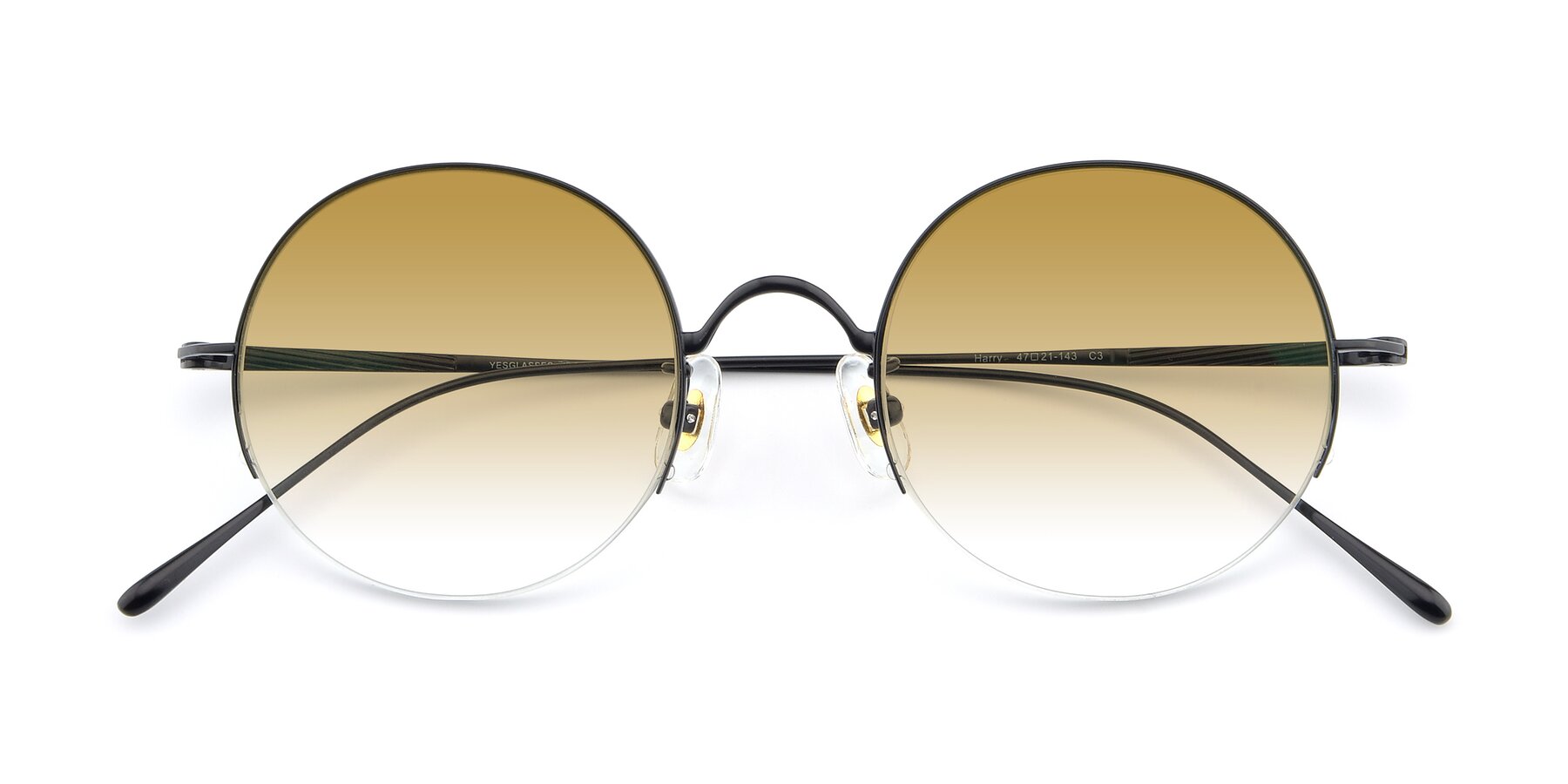 Folded Front of Harry in Matte Black with Champagne Gradient Lenses