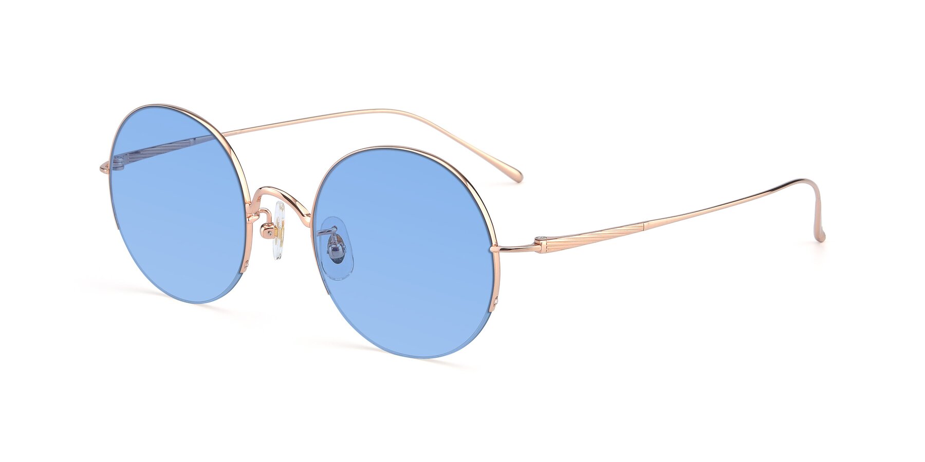 Angle of Harry in Rose Gold with Medium Blue Tinted Lenses