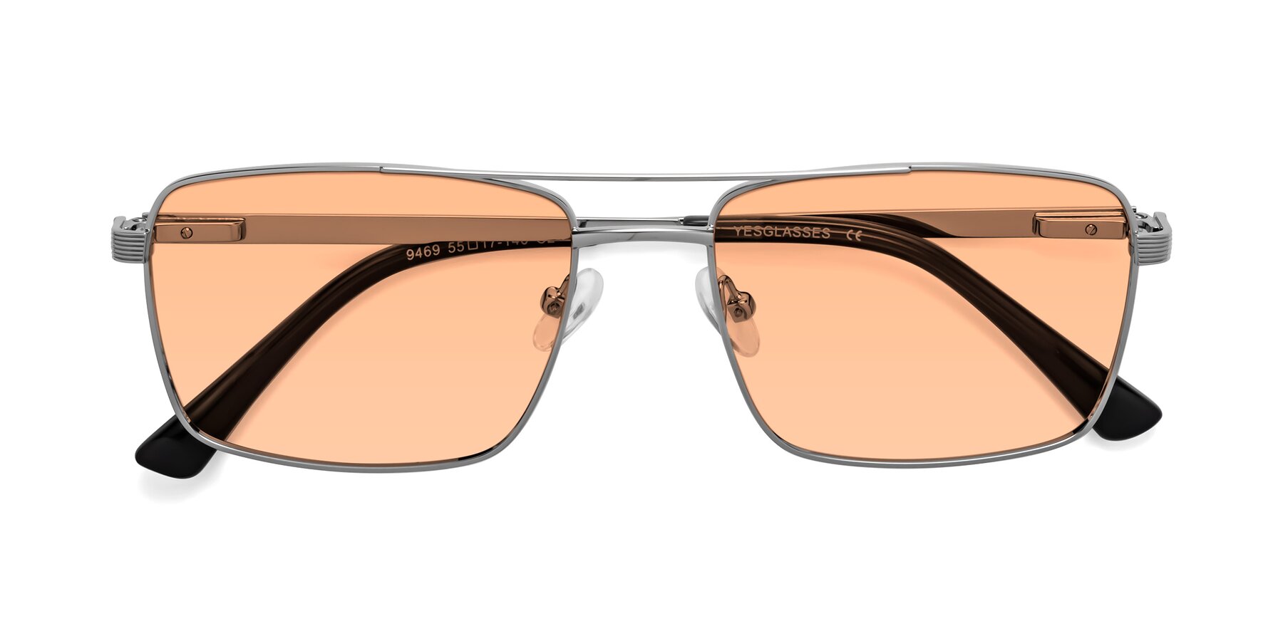 Folded Front of Beckum in Silver with Light Orange Tinted Lenses
