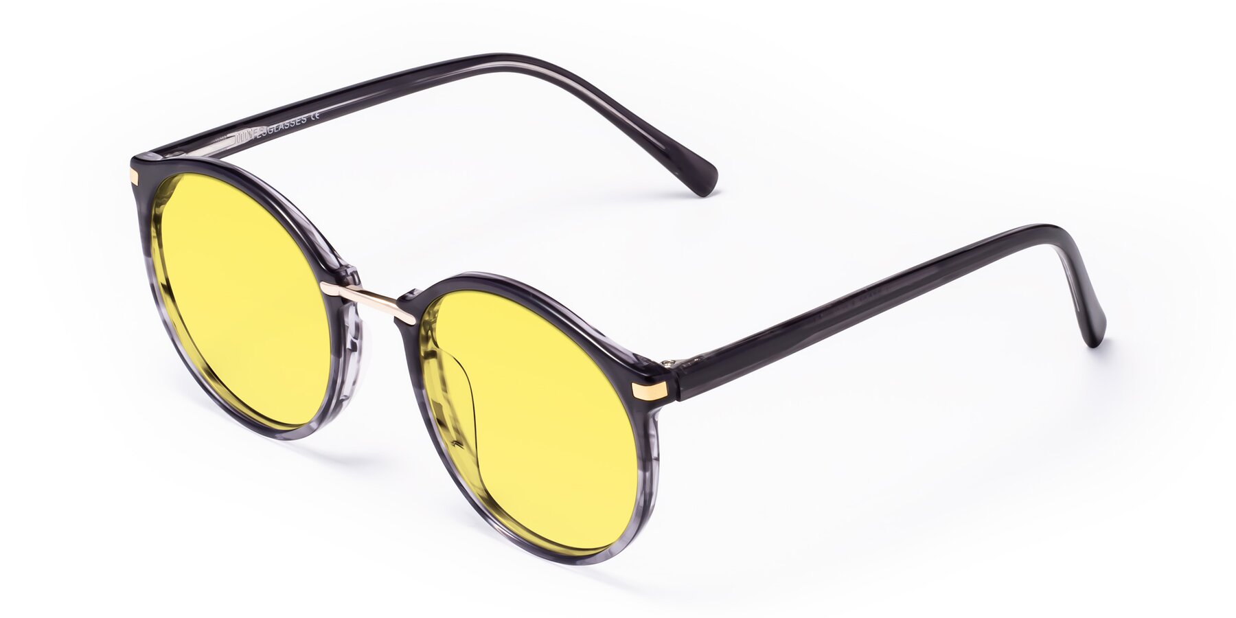 Angle of Casper in Translucent Black with Medium Yellow Tinted Lenses