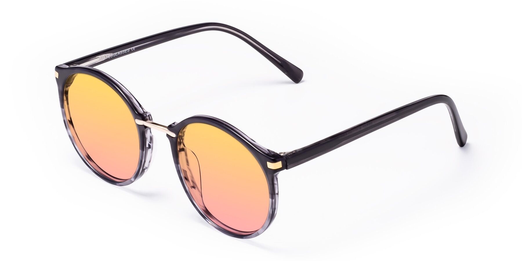 Angle of Casper in Translucent Black with Yellow / Pink Gradient Lenses