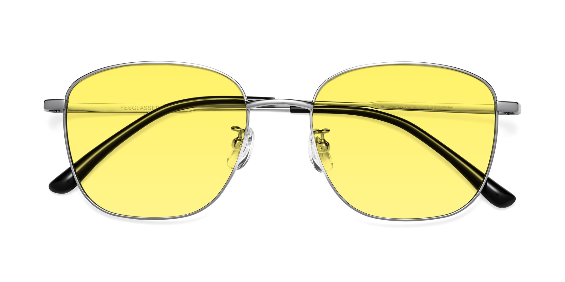 Folded Front of Tim in Silver with Medium Yellow Tinted Lenses