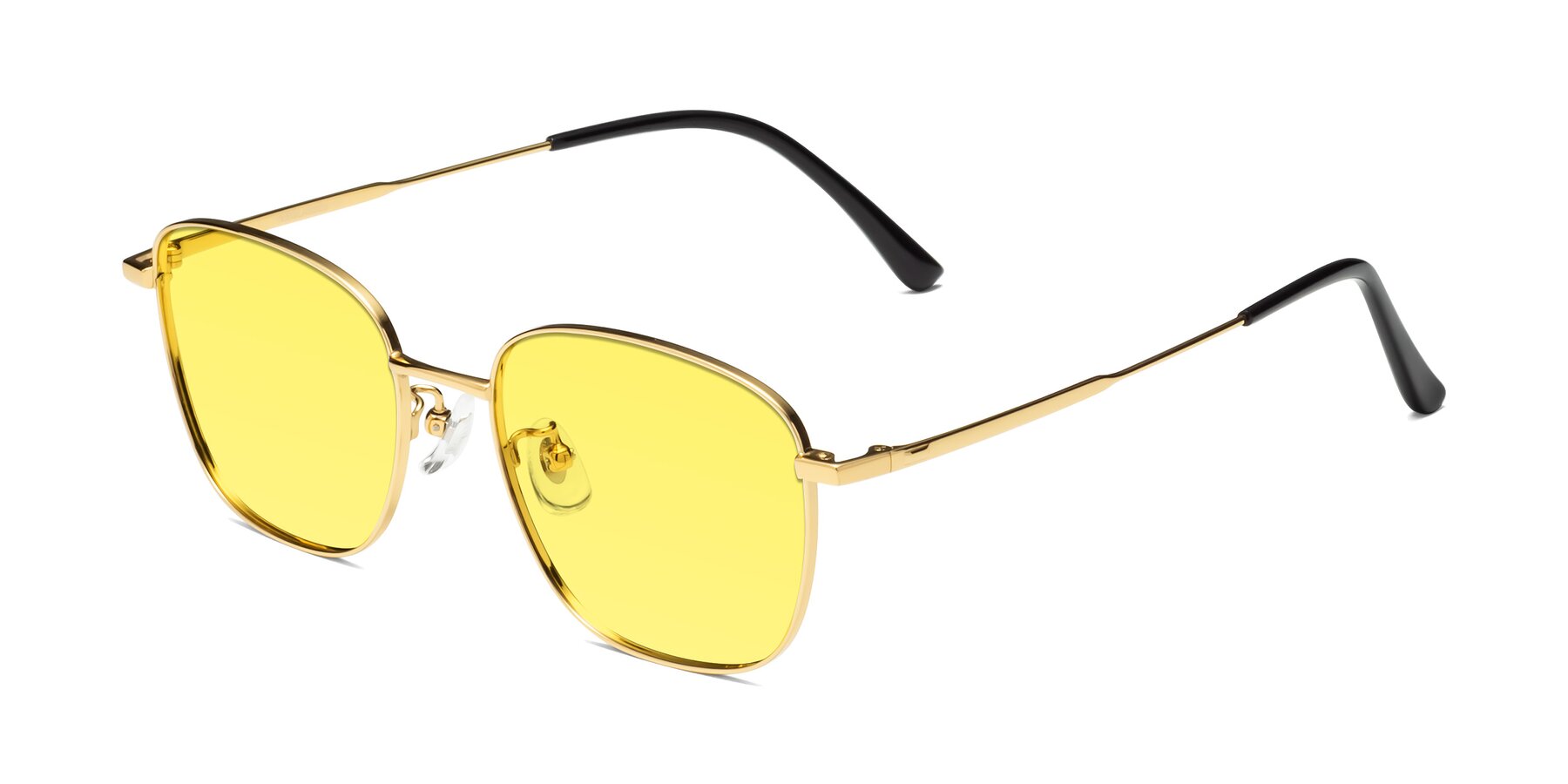 Angle of Tim in Gold with Medium Yellow Tinted Lenses