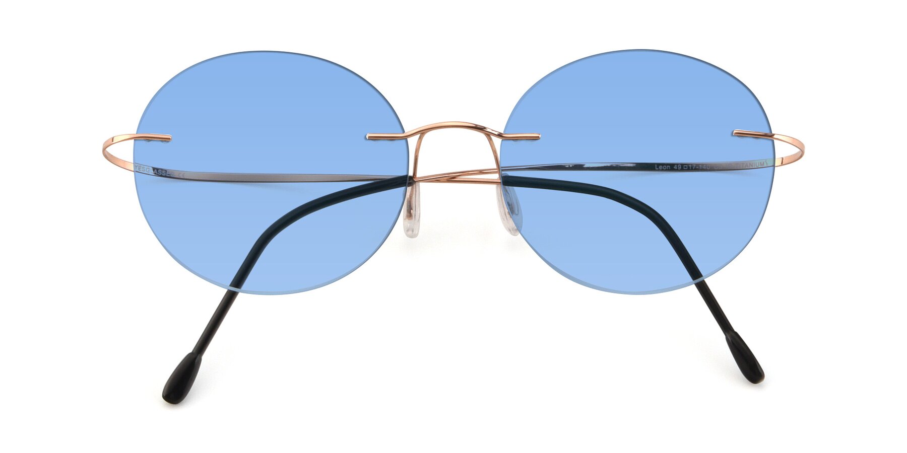 Folded Front of Leon in Rose Gold with Medium Blue Tinted Lenses