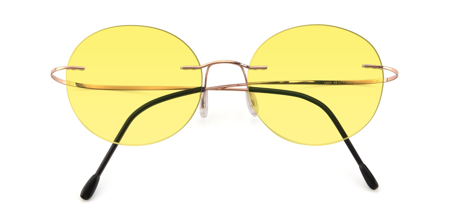 Folded Front of Leon in Rose Gold with Medium Yellow Tinted Lenses