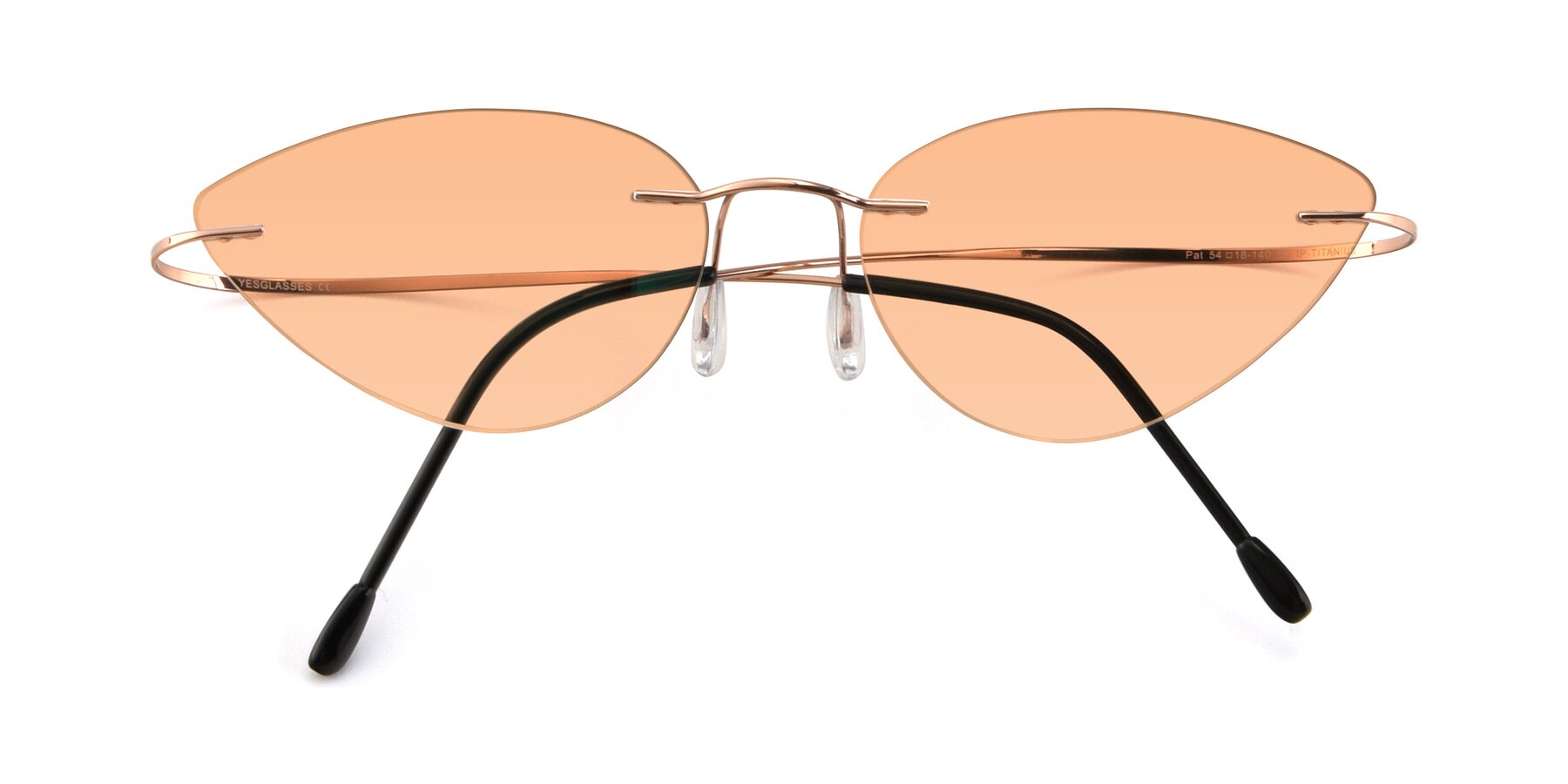 Folded Front of Pat in Rose Gold with Light Orange Tinted Lenses