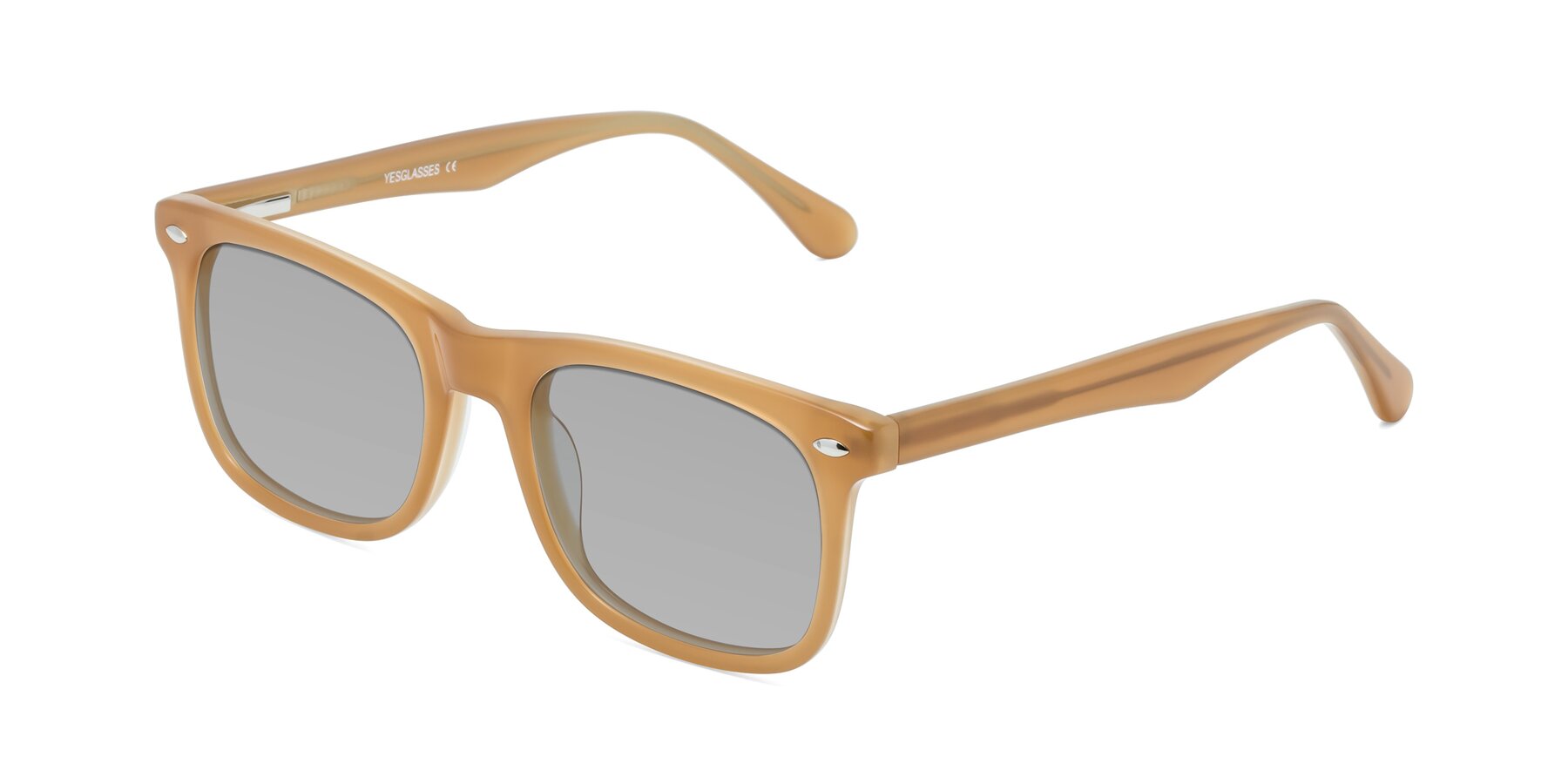 Angle of 007 in Caramel with Light Gray Tinted Lenses