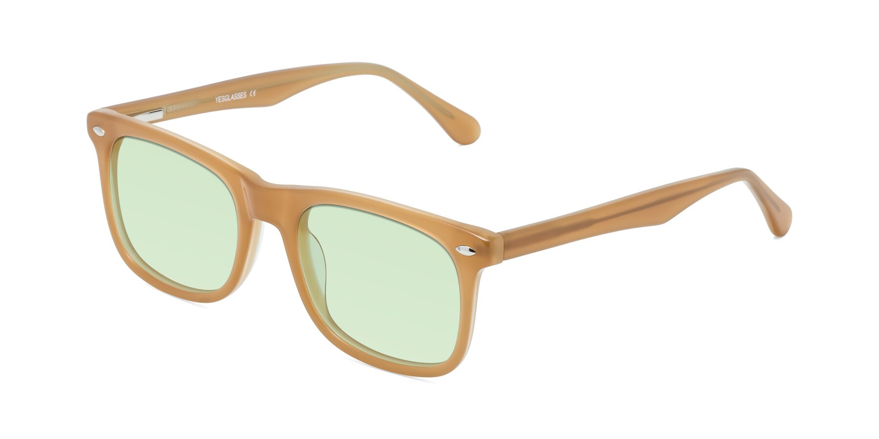 Angle of 007 in Caramel with Light Green Tinted Lenses