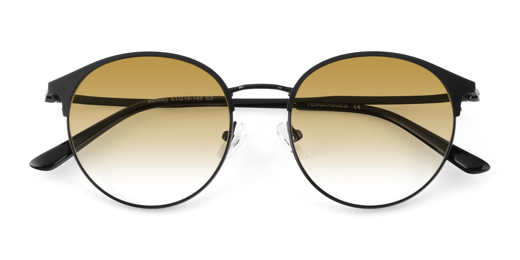 Folded Front of Berkley in Matte Black with Champagne Gradient Lenses
