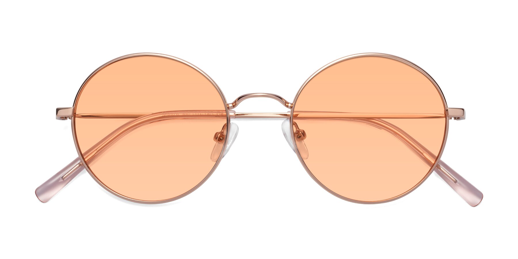 Folded Front of Moore in Rose Gold with Light Orange Tinted Lenses