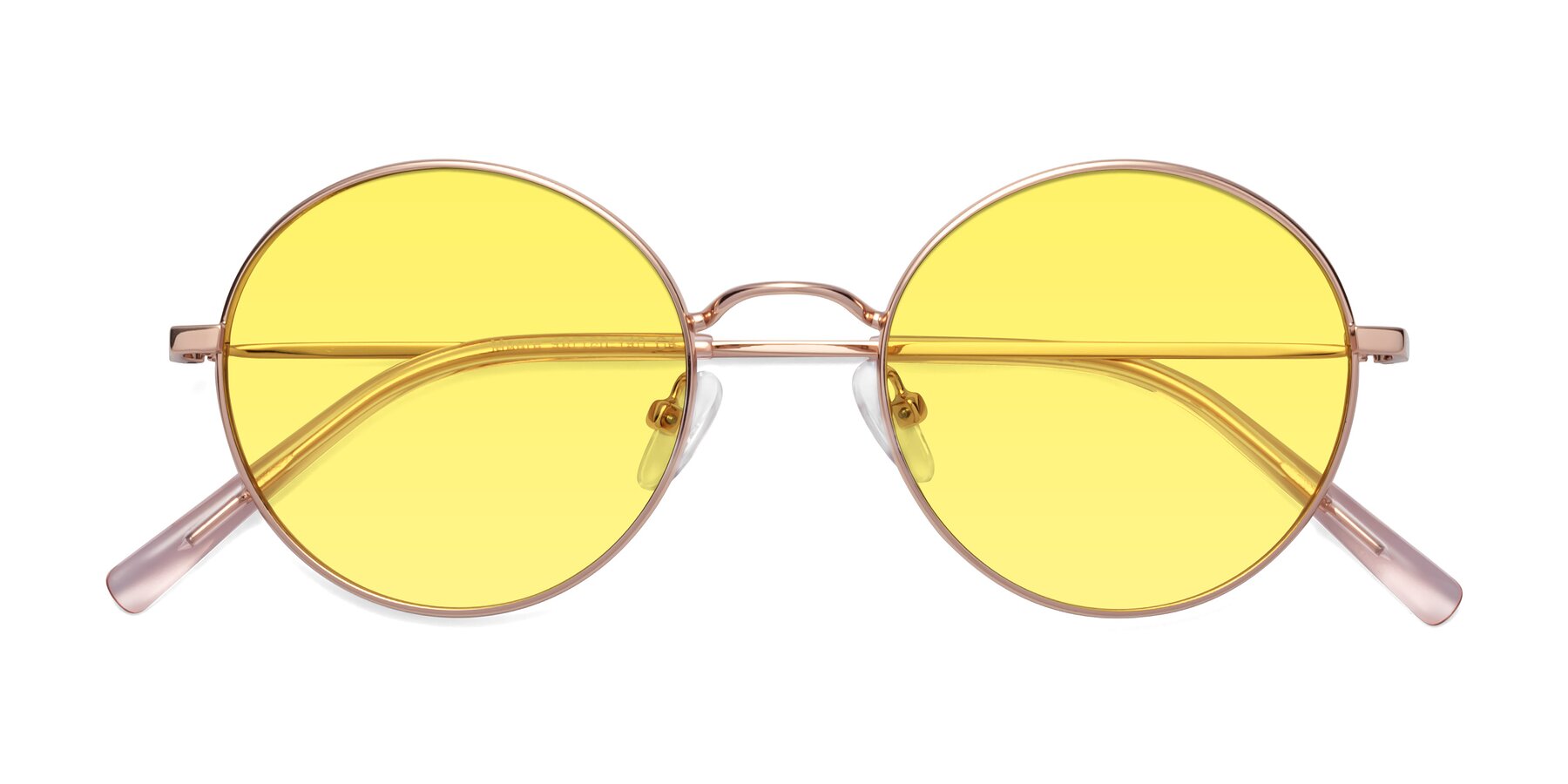 Folded Front of Moore in Rose Gold with Medium Yellow Tinted Lenses