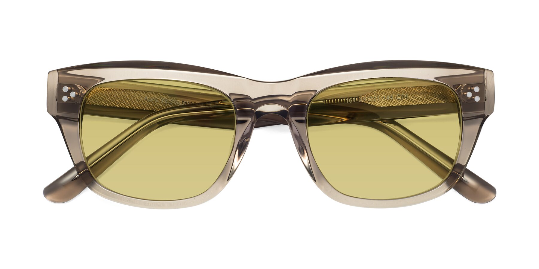 Folded Front of April in Amber with Medium Champagne Tinted Lenses