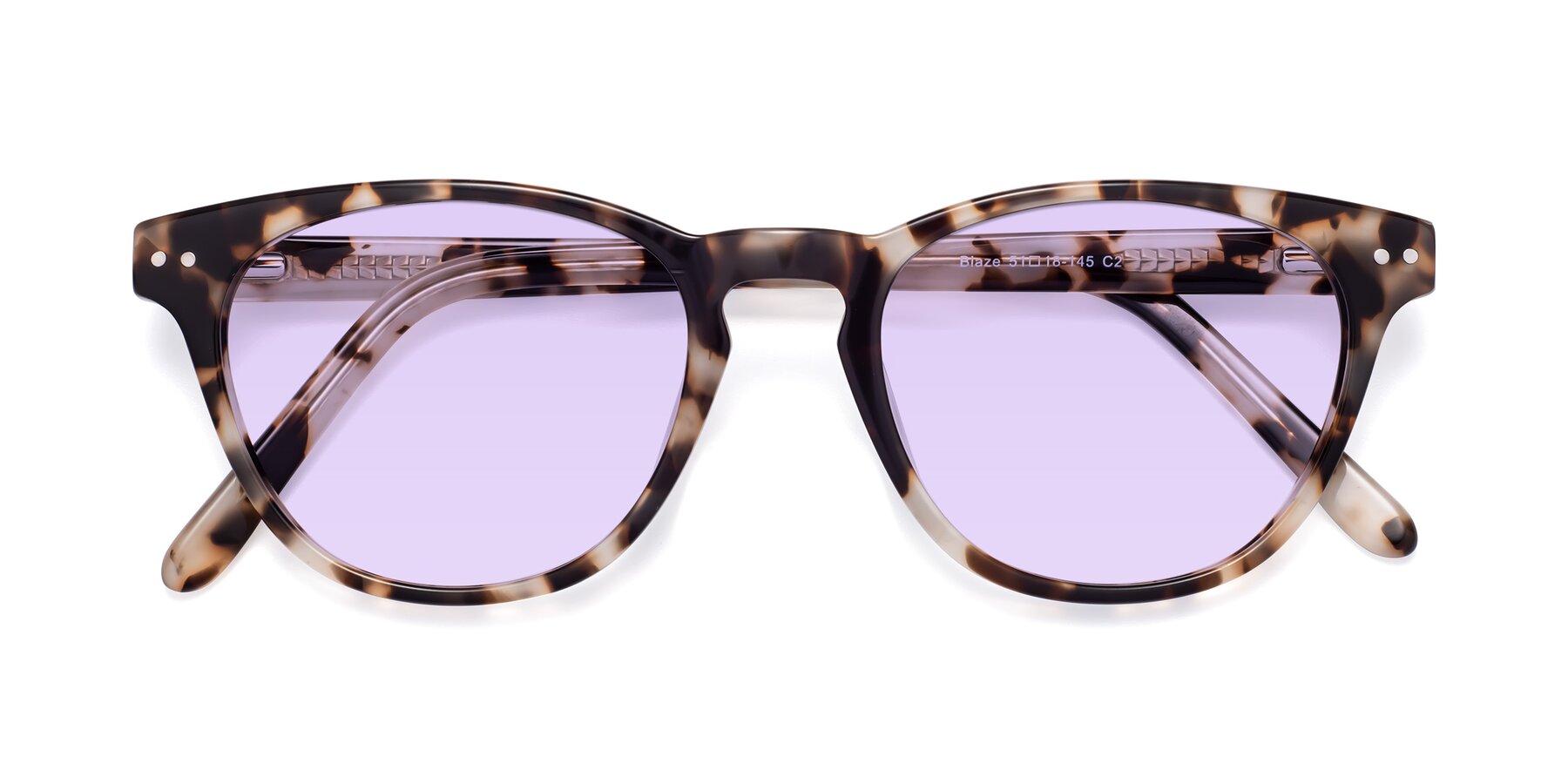 Folded Front of Blaze in Tortoise with Light Purple Tinted Lenses