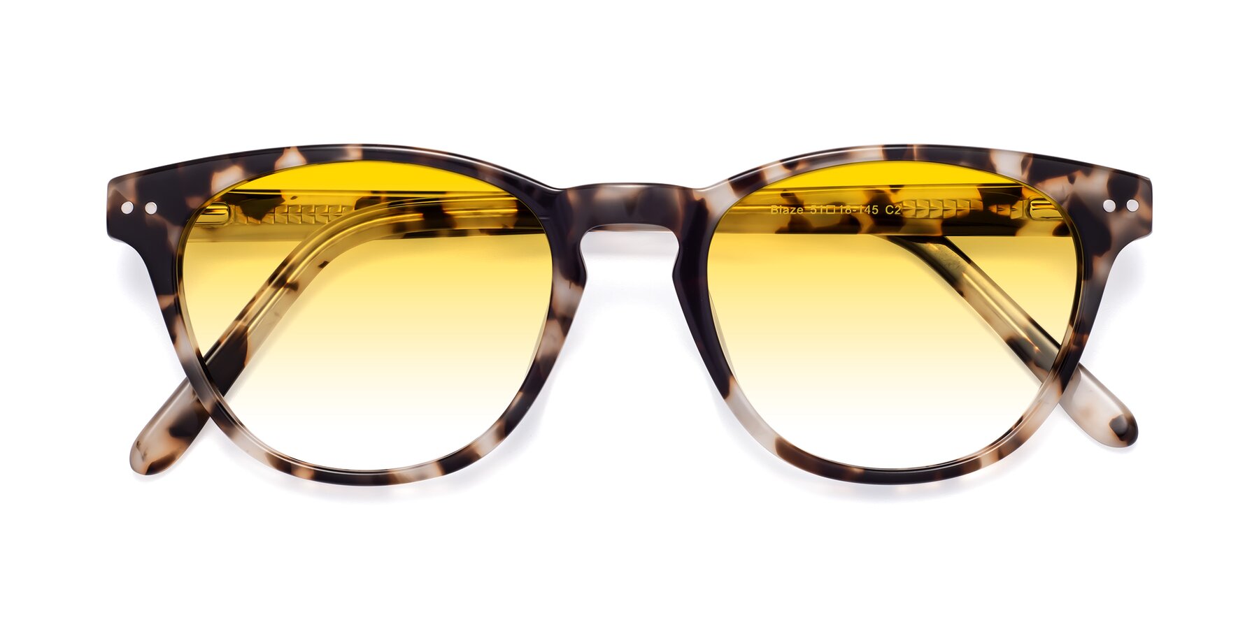 Folded Front of Blaze in Ivory Tortoise with Yellow Gradient Lenses