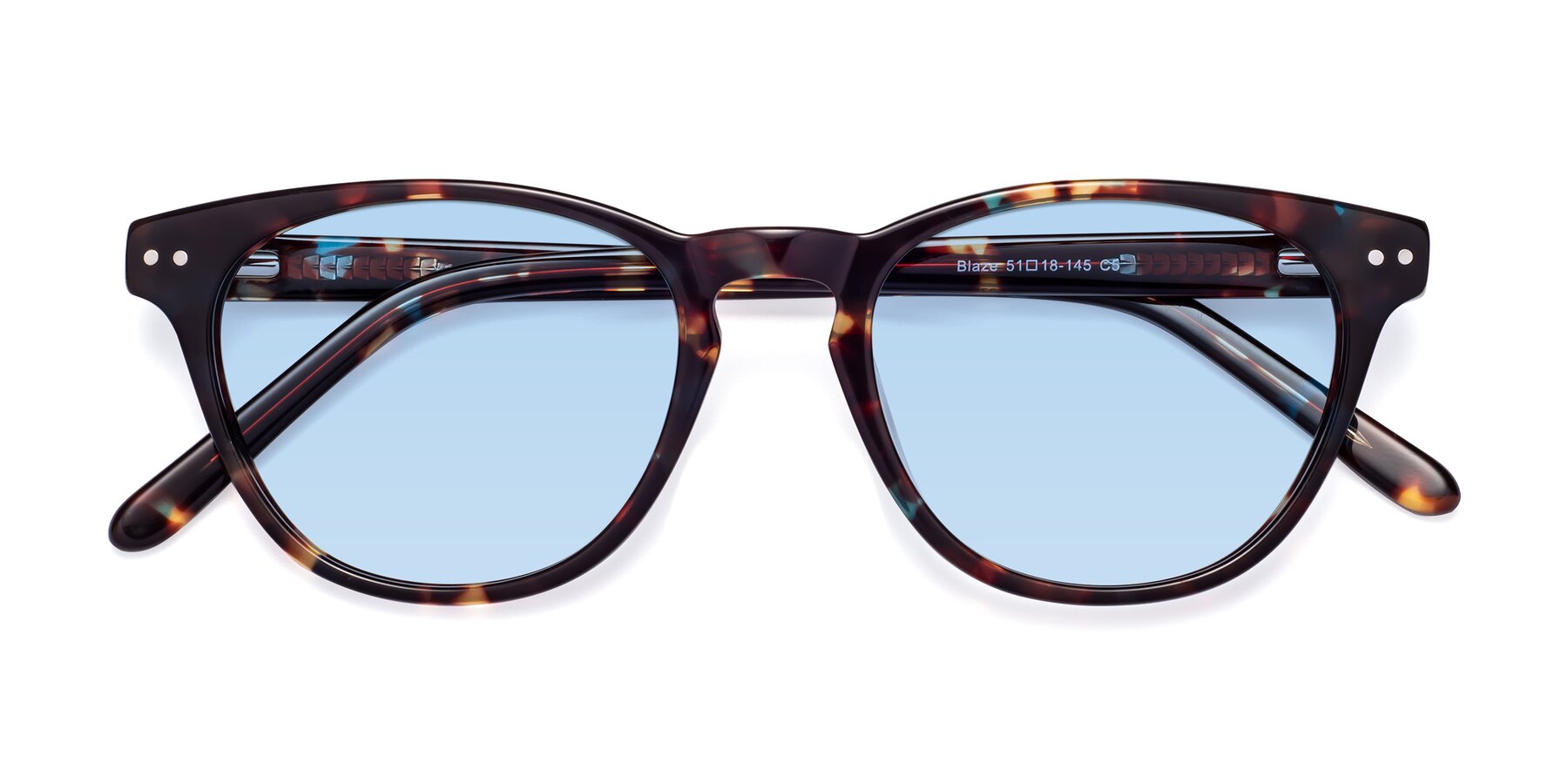 Folded Front of Blaze in Floral Tortoise with Light Blue Tinted Lenses