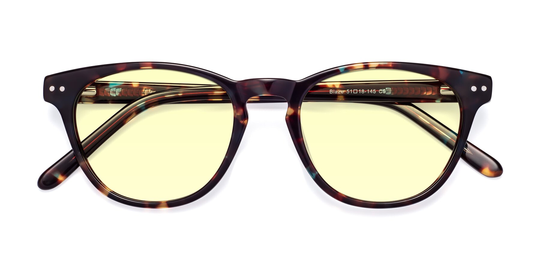 Folded Front of Blaze in Floral Tortoise with Light Yellow Tinted Lenses