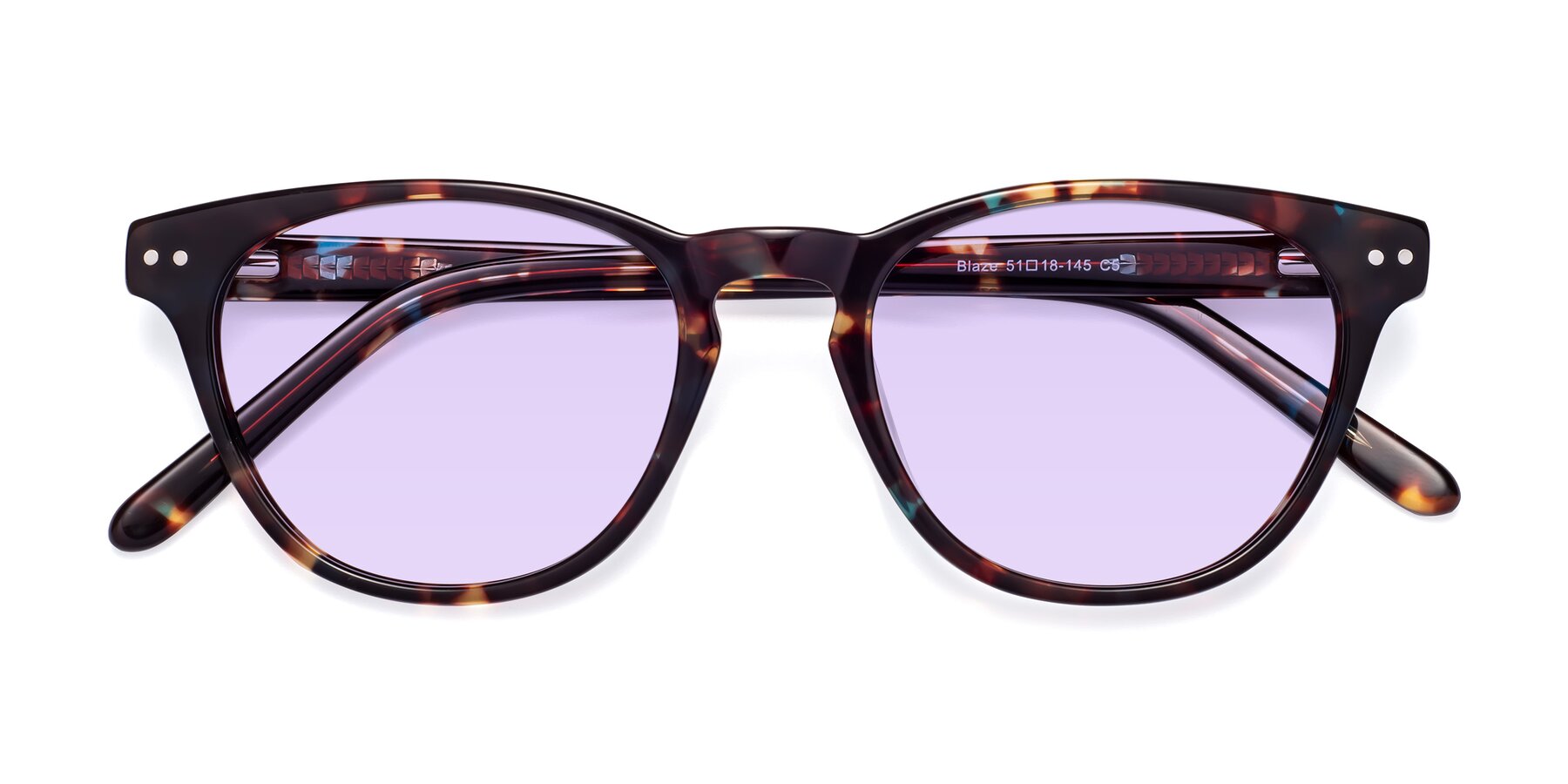 Folded Front of Blaze in Floral Tortoise with Light Purple Tinted Lenses