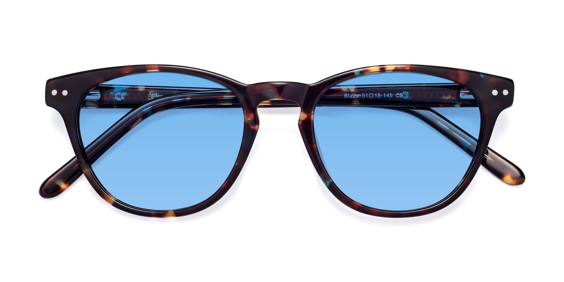 Folded Front of Blaze in Floral Tortoise with Medium Blue Tinted Lenses