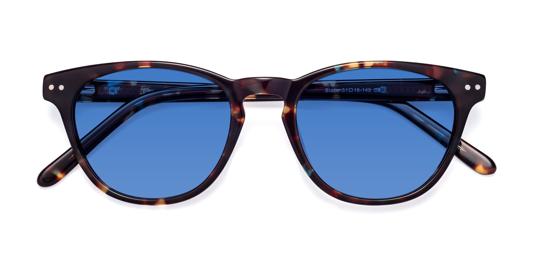 Folded Front of Blaze in Floral Tortoise with Blue Tinted Lenses