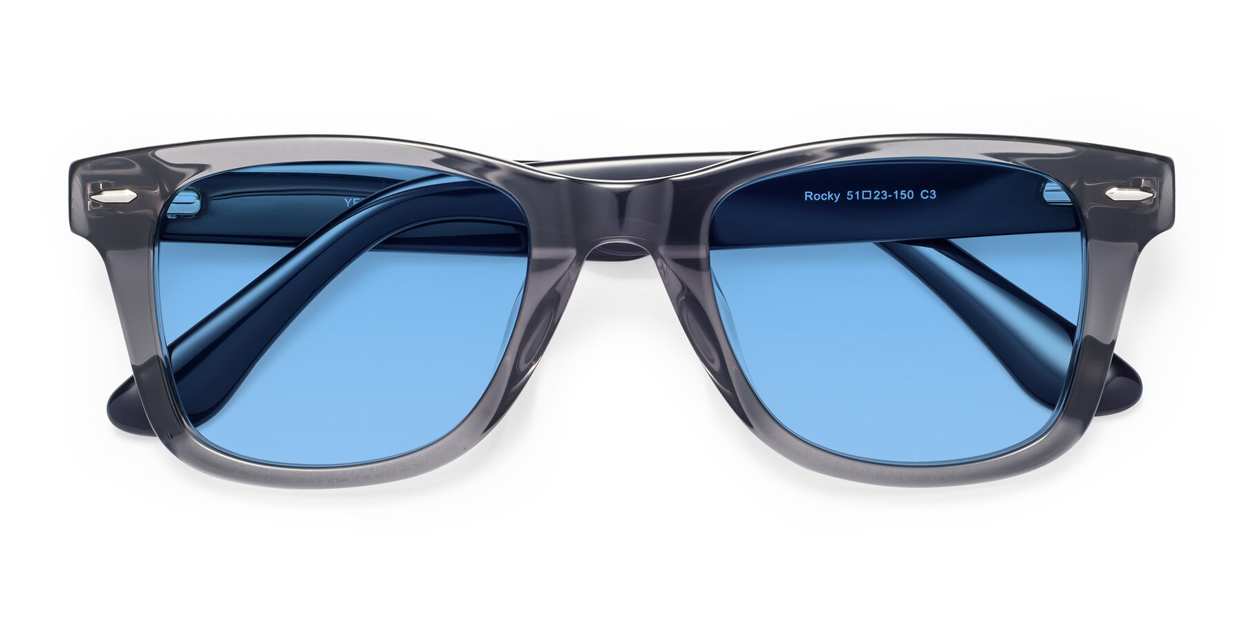 Folded Front of Rocky in Transprent Grey with Medium Blue Tinted Lenses