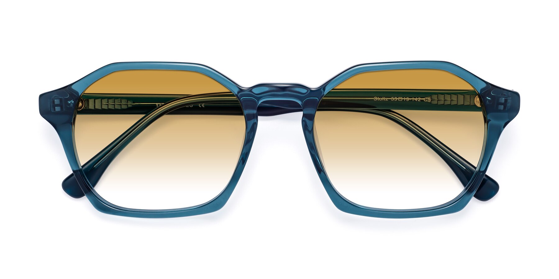 Folded Front of Stoltz in Ink Blue with Champagne Gradient Lenses