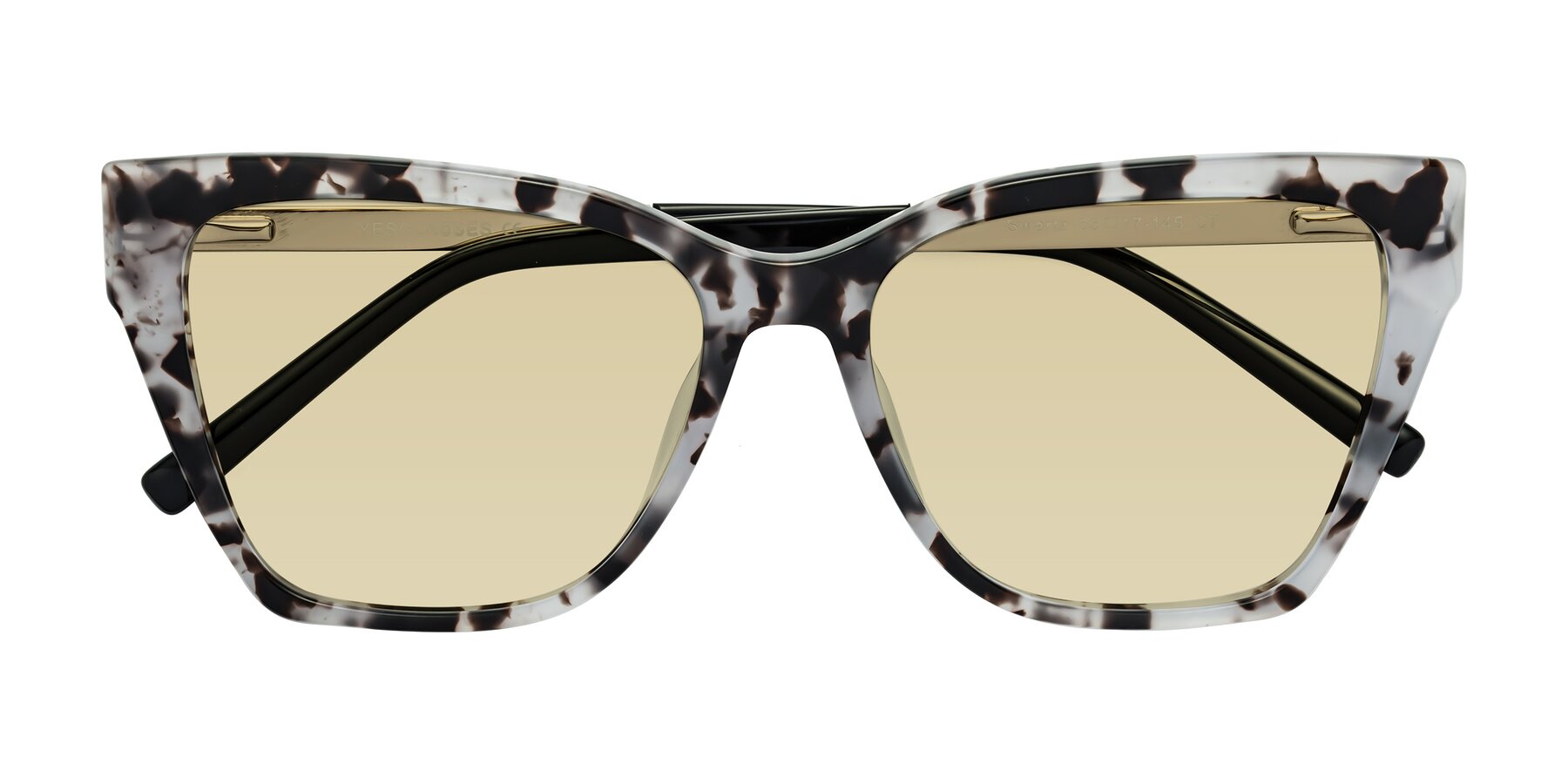 Folded Front of Swartz in White Tortoise with Light Champagne Tinted Lenses