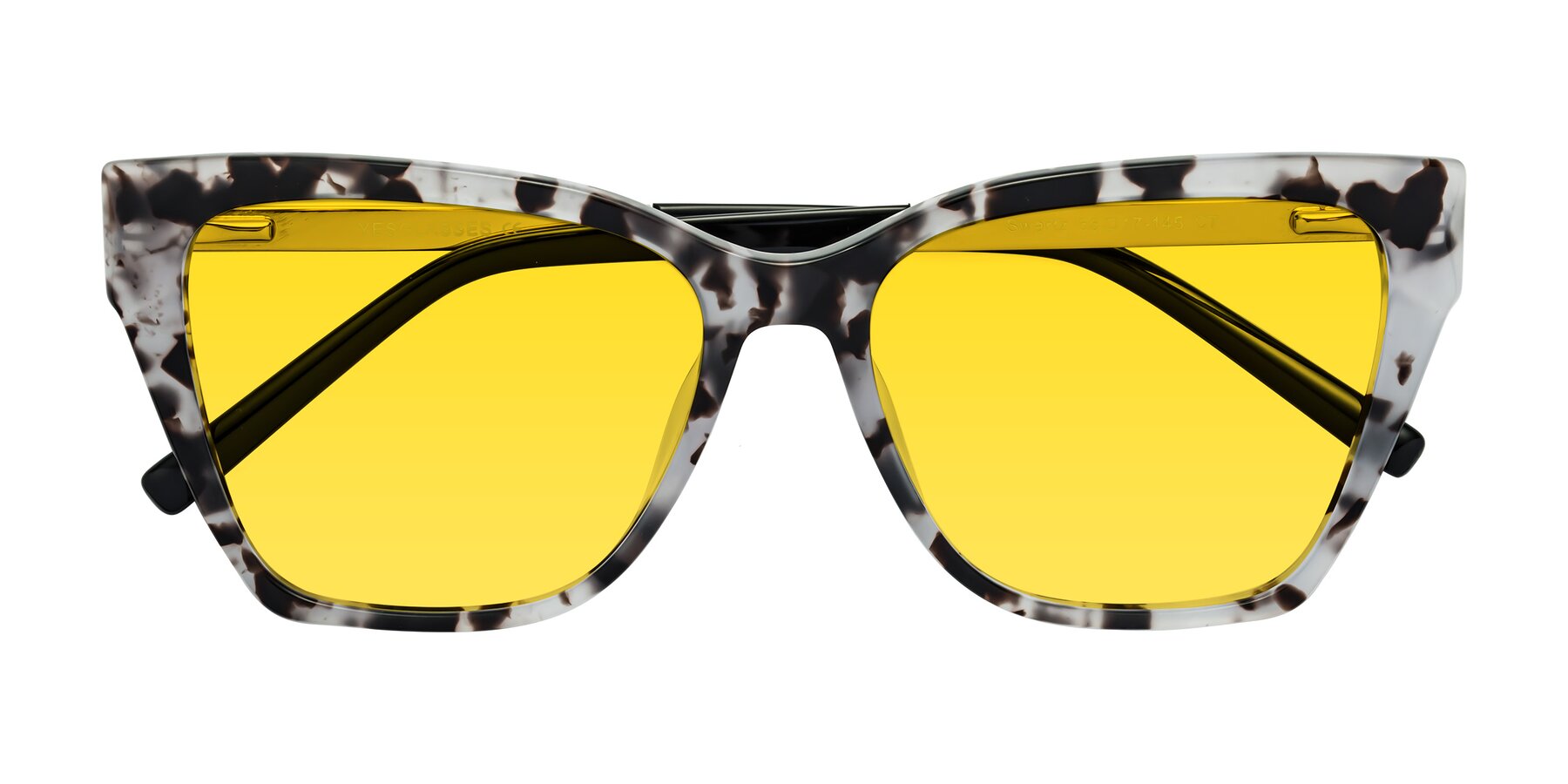Folded Front of Swartz in White Tortoise with Yellow Tinted Lenses