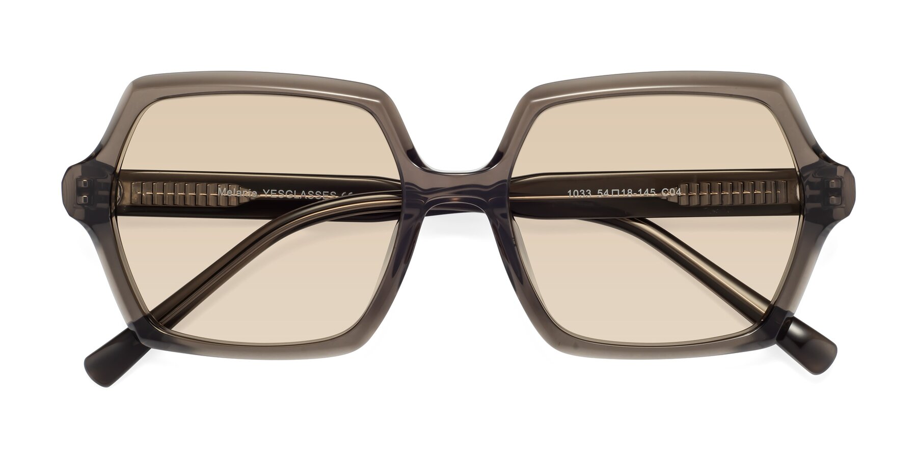 Folded Front of Melanie in Transparent Gray with Light Brown Tinted Lenses