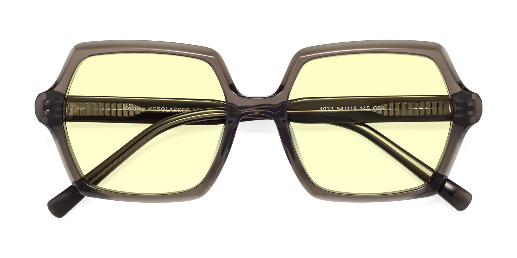 Folded Front of Melanie in Transparent Gray with Light Yellow Tinted Lenses