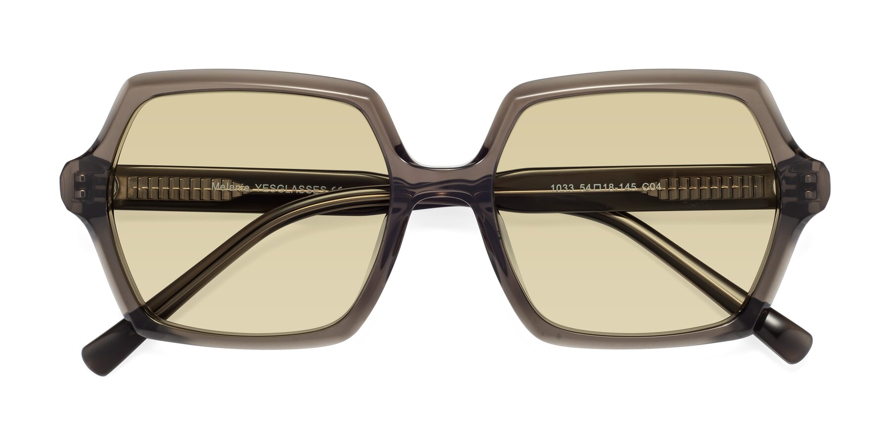Folded Front of Melanie in Transparent Gray with Light Champagne Tinted Lenses