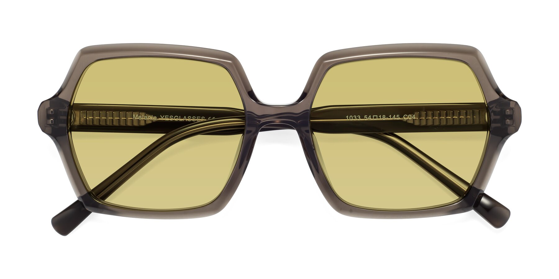 Folded Front of Melanie in Transparent Gray with Medium Champagne Tinted Lenses