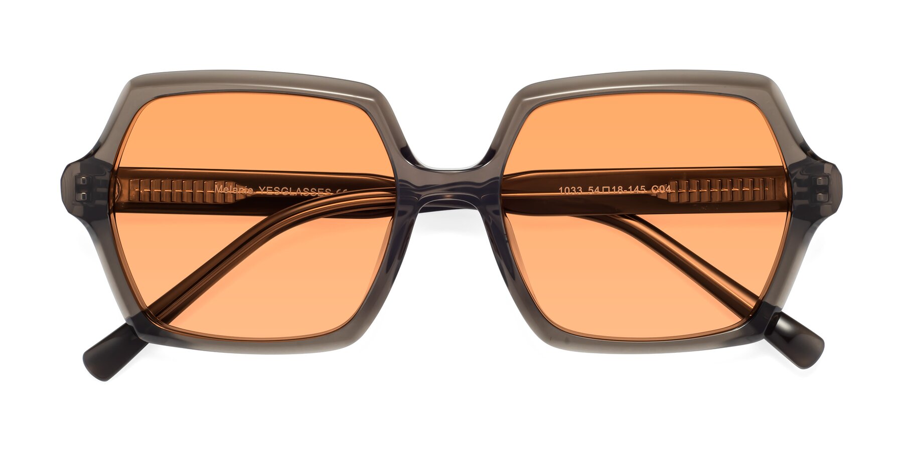 Folded Front of Melanie in Transparent Gray with Medium Orange Tinted Lenses