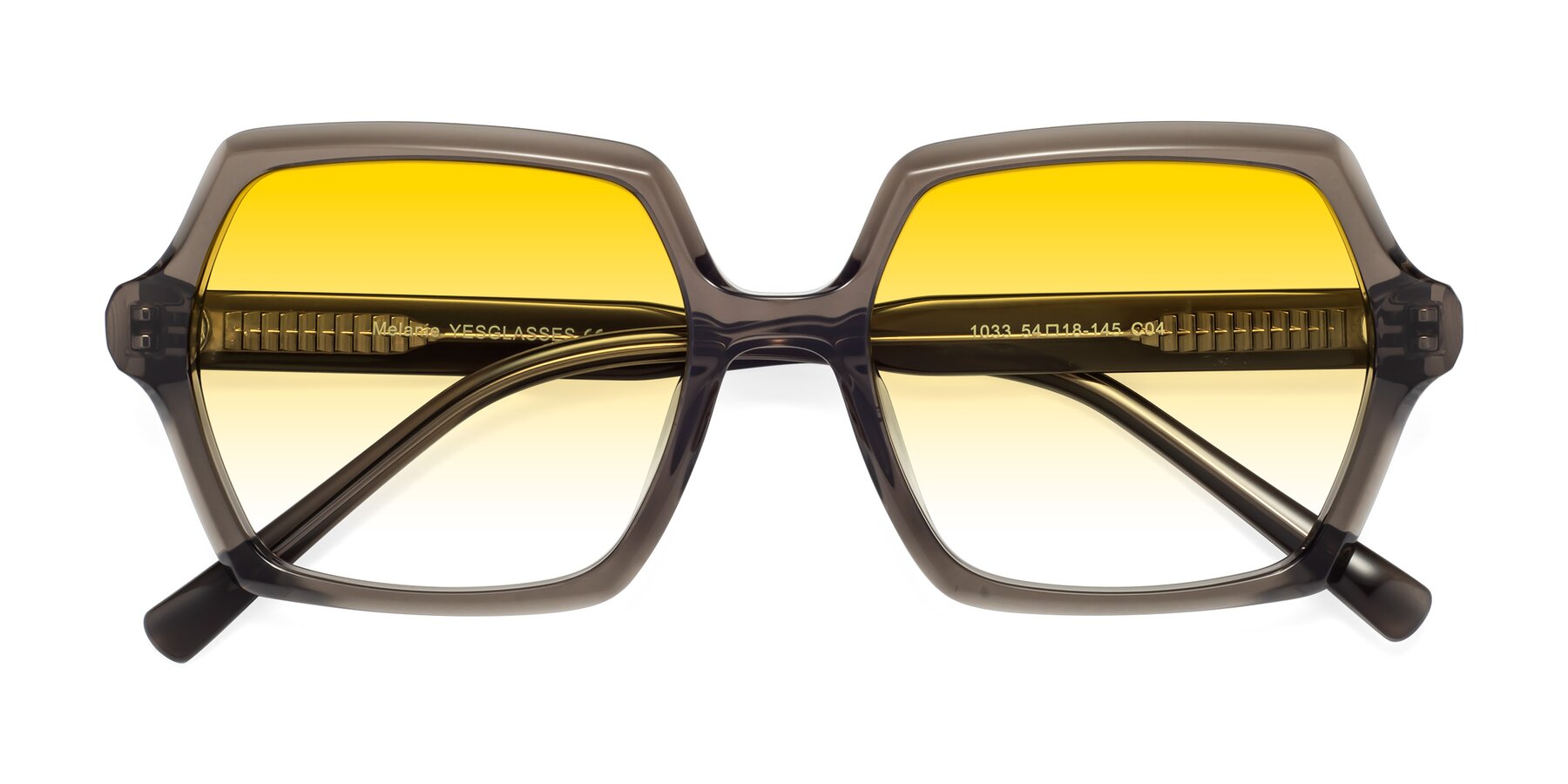 Folded Front of Melanie in Transparent Gray with Yellow Gradient Lenses