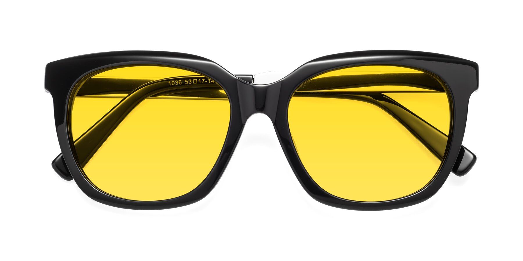 Folded Front of Talent in Black with Yellow Tinted Lenses