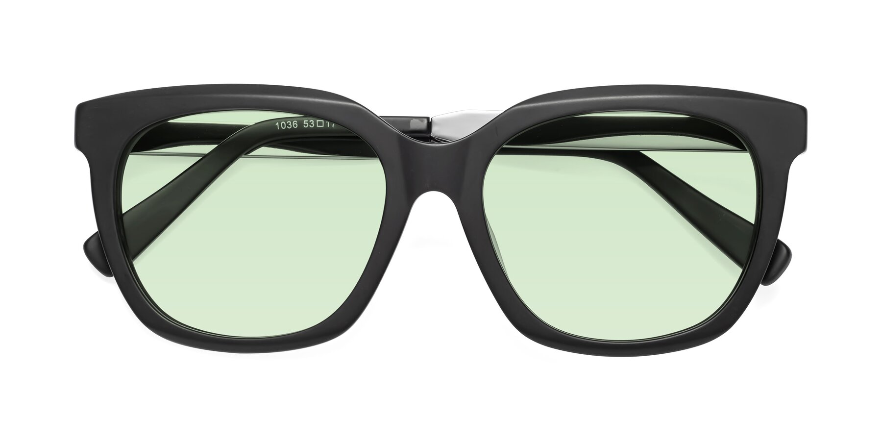 Folded Front of Talent in Matte Black with Light Green Tinted Lenses