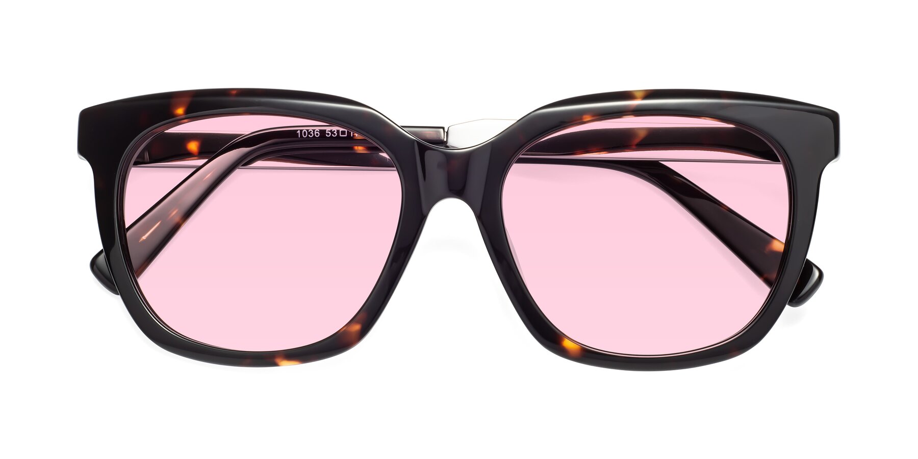 Folded Front of Talent in Tortoise with Light Pink Tinted Lenses