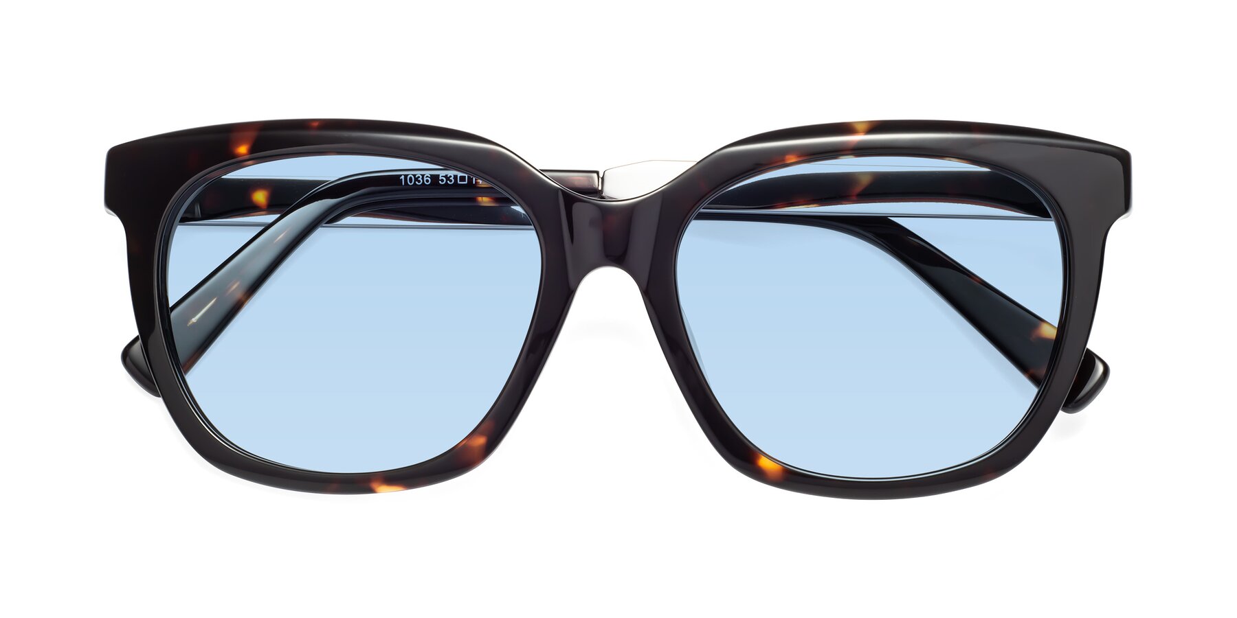 Folded Front of Talent in Tortoise with Light Blue Tinted Lenses