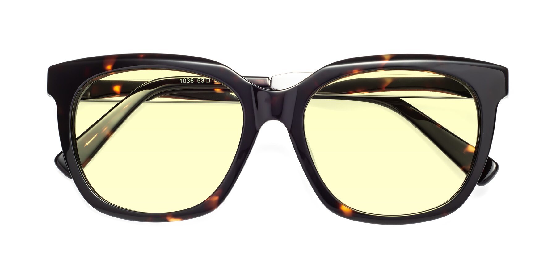 Folded Front of Talent in Tortoise with Light Yellow Tinted Lenses