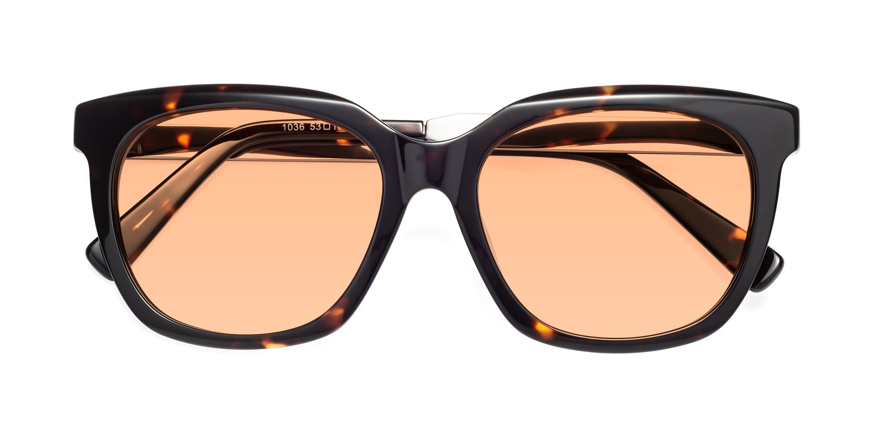 Folded Front of Talent in Tortoise with Light Orange Tinted Lenses